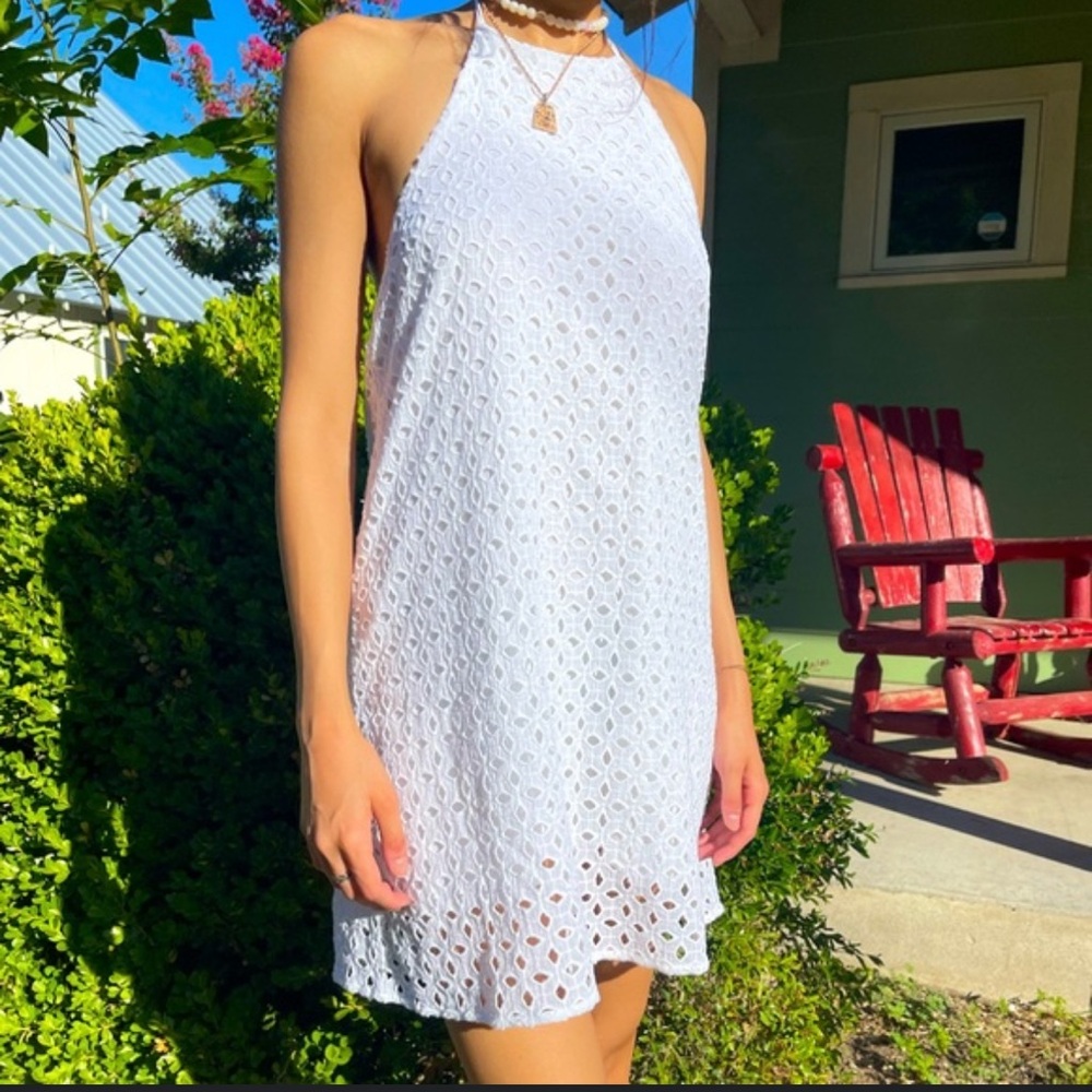 Boutique Impeccable Pig Eyelet White Halter Mini Dress